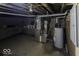 Unfinished basement with exposed utilities, ideal for storage or customization at 337 E Minnesota St, Indianapolis, IN 46225