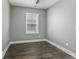 Well-lit bedroom with hardwood floors and a window, perfect for relaxation at 337 E Minnesota St, Indianapolis, IN 46225