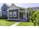 Charming single-Gathering home features new siding, white trim, and a welcoming front porch at 337 E Minnesota St, Indianapolis, IN 46225