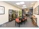 Stylish conference room featuring a large table, accent wall, and sophisticated decor at 350 N Meridian St # 205, Indianapolis, IN 46204