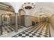 Grand lobby with patterned floors, arched ceilings, and elegant chandelier lighting at 350 N Meridian St # 205, Indianapolis, IN 46204