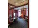 Elegant community lounge area with stylish seating, chandelier lighting and large windows at 350 N Meridian St # 205, Indianapolis, IN 46204