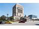 Monument surrounded by parked cars, set against a clear sky at 350 N Meridian St # 205, Indianapolis, IN 46204