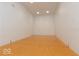 Spacious racquetball court with a clean, well-maintained hardwood floor and bright lighting at 350 N Meridian St # 205, Indianapolis, IN 46204
