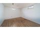 Finished basement with vinyl floors, creating a versatile and comfortable living space at 3510 Chamberlin Dr, Indianapolis, IN 46237