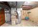 Basement features a water heater, and HVAC system, all essential components of a well-maintained home at 3510 Chamberlin Dr, Indianapolis, IN 46237
