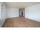 Bright and spacious living room with hardwood floors, perfect for entertaining or relaxing at 3510 Chamberlin Dr, Indianapolis, IN 46237