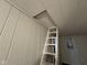 Ladder providing access to the attic at 3519 N Whitcomb Ave, Indianapolis, IN 46224