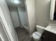 Bathroom featuring new toilet, vanity, and shower/tub combo at 3519 N Whitcomb Ave, Indianapolis, IN 46224