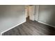 Bedroom featuring hardwood flooring and closet at 3519 N Whitcomb Ave, Indianapolis, IN 46224