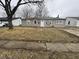 Charming single-story home featuring a well-maintained lawn and a welcoming entrance at 3519 N Whitcomb Ave, Indianapolis, IN 46224