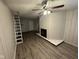 View of the living room featuring wood flooring and a fireplace at 3519 N Whitcomb Ave, Indianapolis, IN 46224