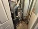 Mechanical room featuring the furnace and hot water heater at 3519 N Whitcomb Ave, Indianapolis, IN 46224