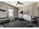 The exercise room has a treadmill, ceiling fan, and rubber mat flooring at 3849 Sun Valley Dr, Westfield, IN 46074