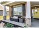 Inviting covered front porch featuring stone columns, bench seating, and stylish decor for a welcoming entrance at 3849 Sun Valley Dr, Westfield, IN 46074