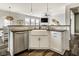 Open concept kitchen with a farm sink, stainless steel dishwasher, and a view of the living space at 3849 Sun Valley Dr, Westfield, IN 46074