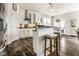 Modern kitchen featuring stainless steel appliances, a breakfast bar, and seamless flow to dining area at 3849 Sun Valley Dr, Westfield, IN 46074