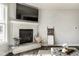 Bright and airy living room showcasing the modern fireplace, decor, and open space at 3849 Sun Valley Dr, Westfield, IN 46074