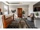 Spacious bedroom with wood floors, large wardrobe, sitting area and ample natural light at 3849 Sun Valley Dr, Westfield, IN 46074