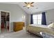 Bedroom with vaulted ceiling, ceiling fan, walk-in closet and ensuite bathroom at 3856 Cornwallis Ln, Carmel, IN 46032