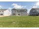 Spacious backyard featuring lush green grass, offering ample space for outdoor activities and relaxation at 4016 Railhead Ave, Westfield, IN 46074