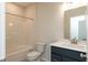 Bathroom with tub, toilet, vanity, and mirror at 4016 Railhead Ave, Westfield, IN 46074