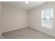 Bedroom with neutral carpet, large window with blinds and neutral wall color at 4016 Railhead Ave, Westfield, IN 46074