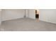 Neutral bedroom features neutral walls, plush carpeting, and an ensuite bath and dressing room at 4016 Railhead Ave, Westfield, IN 46074