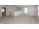 Bright bonus room featuring neutral walls, plush carpeting, and a window providing natural light at 4016 Railhead Ave, Westfield, IN 46074