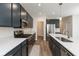 Spacious kitchen with stainless steel appliances, a large island, and modern fixtures, perfect for culinary enthusiasts at 4016 Railhead Ave, Westfield, IN 46074