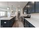 Stylish kitchen with stainless steel appliances, granite countertops, and dark wood cabinets at 4016 Railhead Ave, Westfield, IN 46074