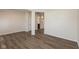 Spacious living room featuring wood floors and an open doorway at 4016 Railhead Ave, Westfield, IN 46074