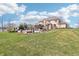 Expansive backyard with a pool, patio, pergola, and lush lawn, perfect for outdoor living and entertaining at 4429 Serengeti Cir, Carmel, IN 46074