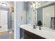 Stylish bathroom featuring a shower, modern vanity, and convenient access to the toilet and shower area at 4429 Serengeti Cir, Carmel, IN 46074