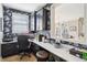 Home office featuring dark floral wallpaper, built-in cabinets, and a functional workspace at 4429 Serengeti Cir, Carmel, IN 46074