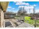 Wood deck overlooking a green backyard with a partial fence line at 4744 Whirlaway Dr, Indianapolis, IN 46237