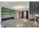 Spacious kitchen with bar area and open to living area at 4744 Whirlaway Dr, Indianapolis, IN 46237