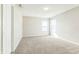 Carpeted bedroom with two windows with plenty of natural light at 4747 Summit Lake Pl, Indianapolis, IN 46239