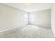 Bright bedroom with carpet flooring, neutral walls, and natural light at 4747 Summit Lake Pl, Indianapolis, IN 46239