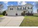 Charming two-story home featuring a two-car garage and well-maintained landscaping at 4747 Summit Lake Pl, Indianapolis, IN 46239