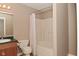 A traditional bathroom with a bathtub, shower, sink and a toilet at 5446 Lippan Way, Indianapolis, IN 46221