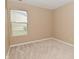 Cozy bedroom featuring neutral walls, carpeting, and a window with blinds at 5446 Lippan Way, Indianapolis, IN 46221