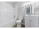 Full bathroom featuring a tub and shower combo with modern fixtures and a white vanity at 6059 S Bay Dr, Indianapolis, IN 46250