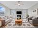 Bright living room with fireplace, neutral décor, and modern furnishings at 6059 S Bay Dr, Indianapolis, IN 46250
