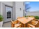 Cozy patio with a wooden dining table and chairs, perfect for outdoor relaxation at 6059 S Bay Dr, Indianapolis, IN 46250