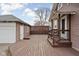 Large backyard deck with access to the house and detached garage at 6158 Ralston Ave, Indianapolis, IN 46220