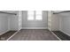 Walk-in closet with built-in shelving and wood accents at 6158 Ralston Ave, Indianapolis, IN 46220