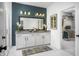 Bathroom featuring double sinks, modern lighting fixtures, and a walk-in closet at 781 Rose Garden Way, Westfield, IN 46074