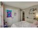 Comfortable bedroom featuring a bright window, ample closet space, and cozy decor at 8107 Parcrest Ct, Indianapolis, IN 46259
