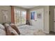 Cozy bedroom features a large window, plush bedding, and soft, inviting decor at 8107 Parcrest Ct, Indianapolis, IN 46259